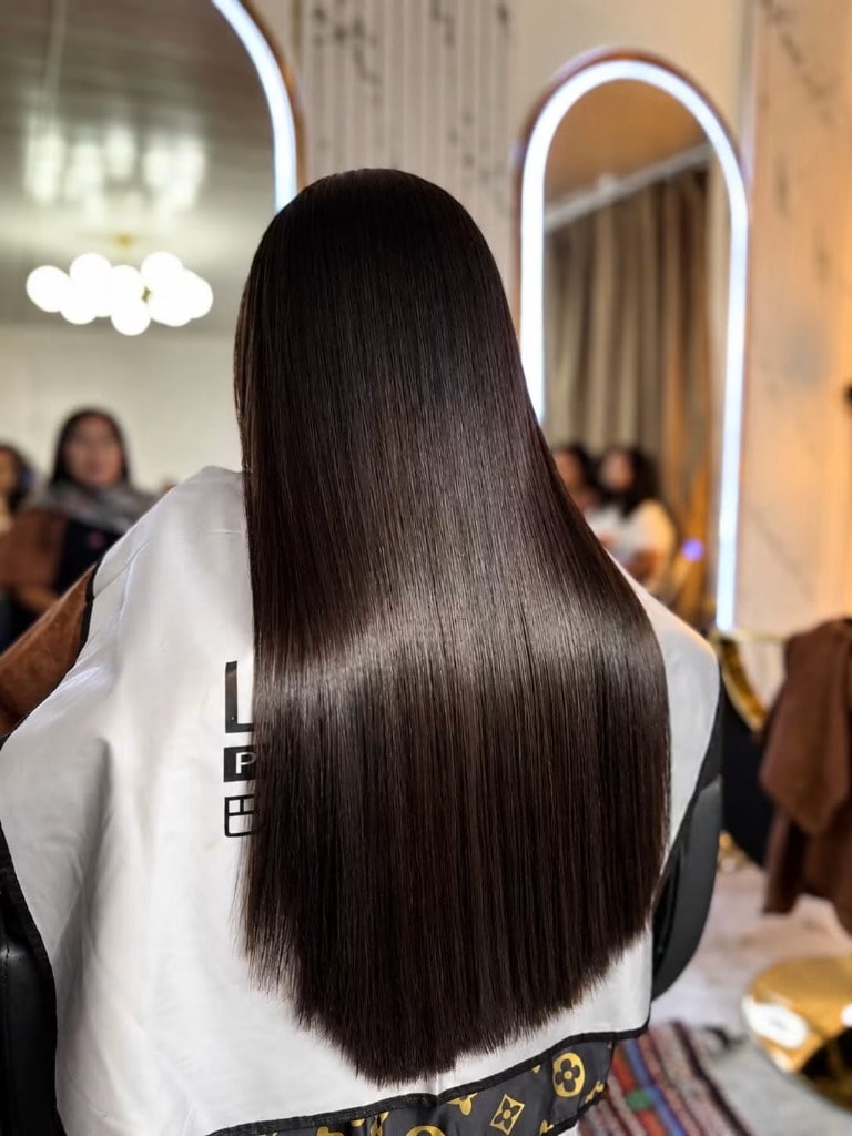 Sleek straight silk hair finish at Timeless Beauty Lounge